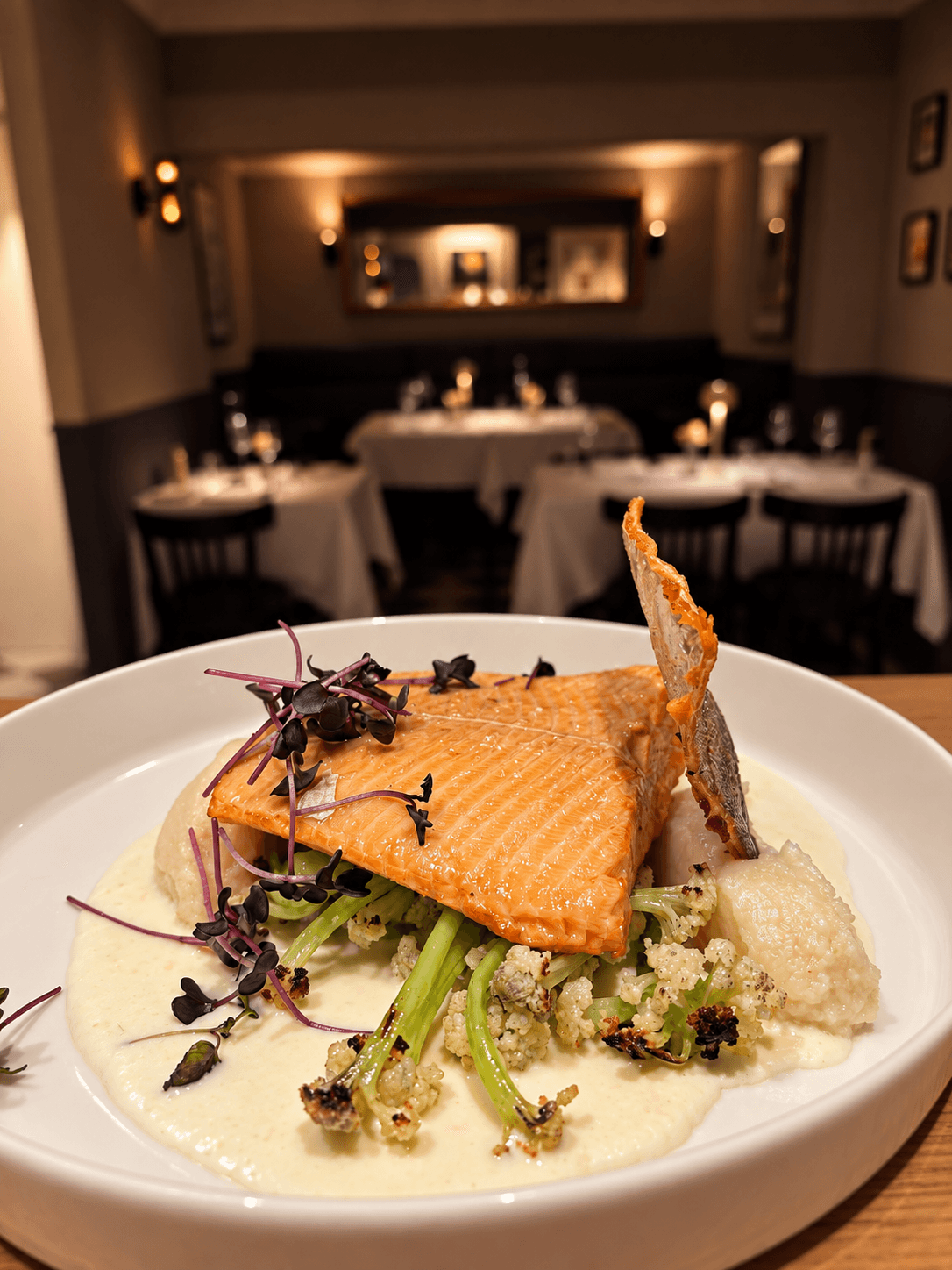 Salmon with cauliflower, purée and a crisp garnish